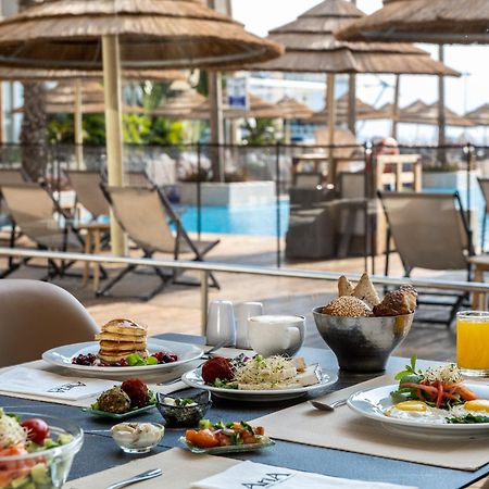 فندق Aria إيلات المظهر الخارجي الصورة A buffet at a hotel